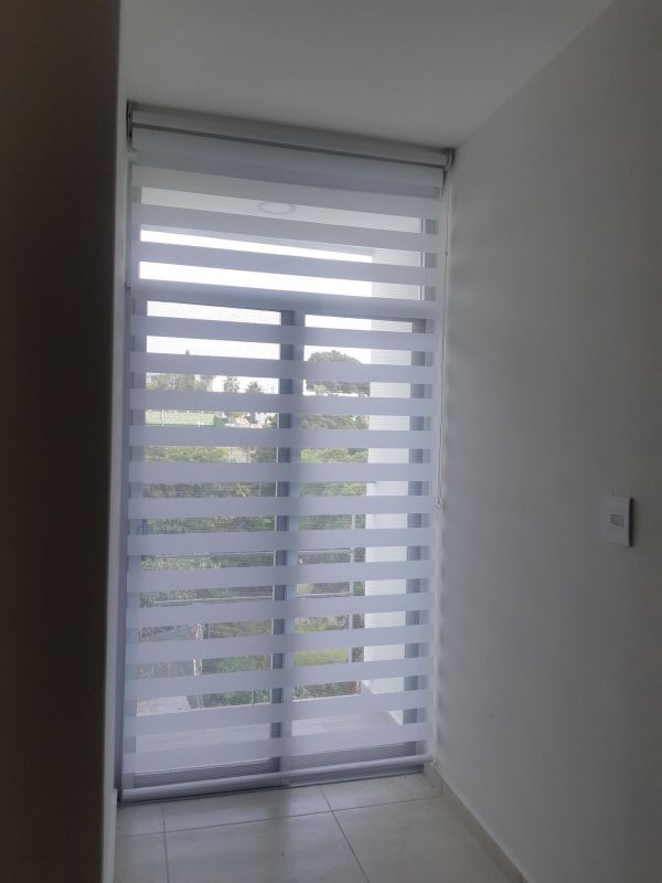{"esp":"Recamara 1 con cortinas","ing":""}